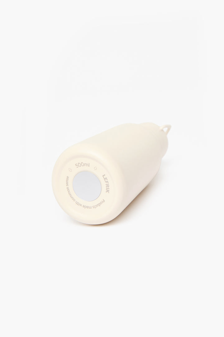 lefrik Circus Bottle Ecru Devoluciones gratuitas