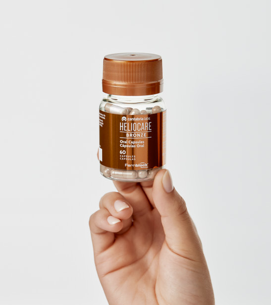 neoretin HELIOCARE Oral Cápsulas Bronze Descuento