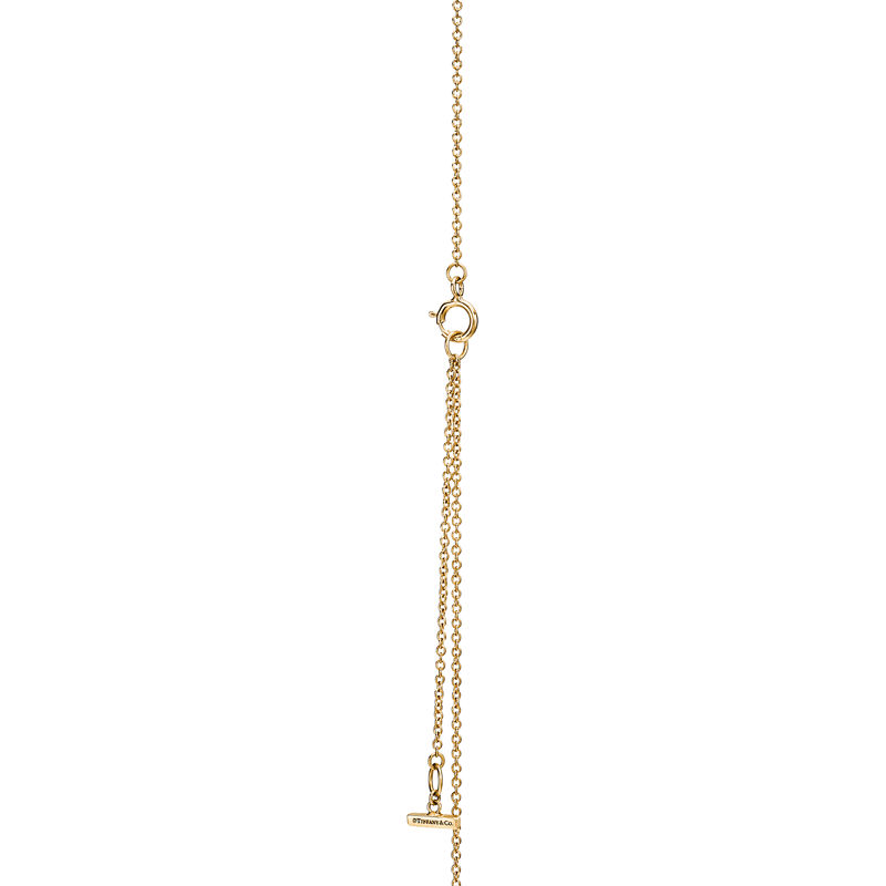 Tiffany & Co. Tiffany T Colgante circular de diamantes y nácar de oro amarillo Superdescuento