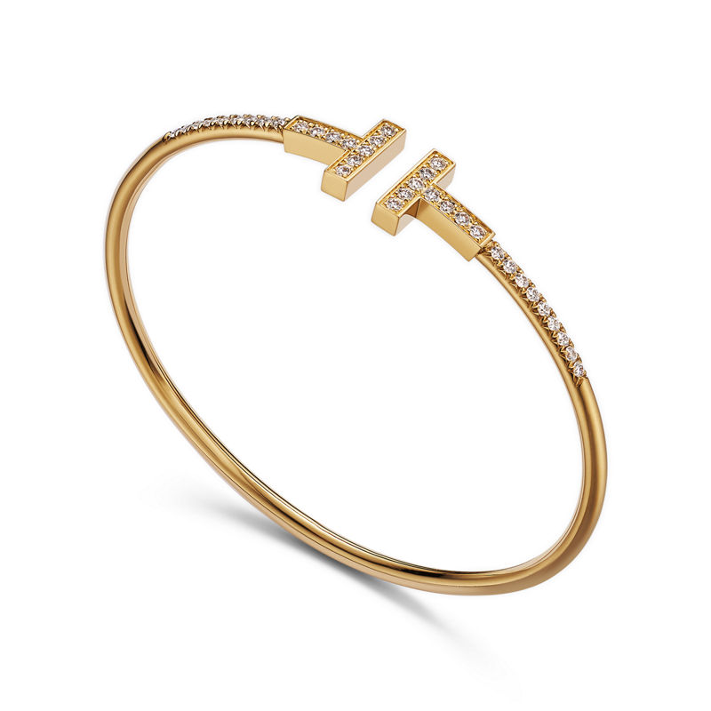 Tiffany & Co. Tiffany T Brazalete Wire con diamantes en pavé de oro amarillo Oferta especial de fábrica