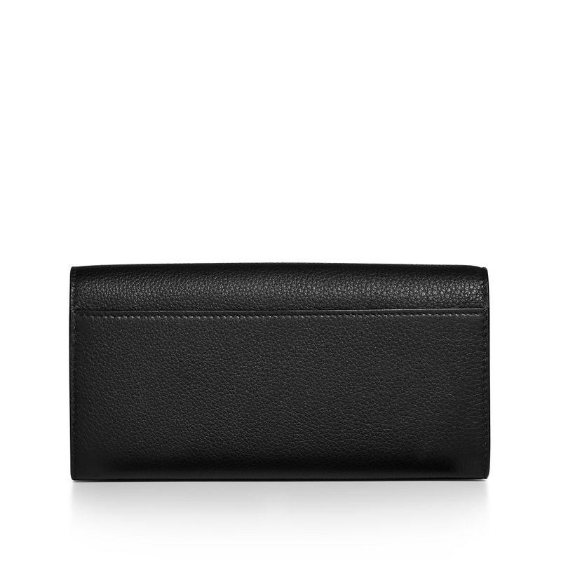 Tiffany & Co. T&CO. Cartera continental de solapa de piel color negro Precios de Black Friday
