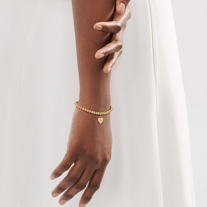 Tiffany & Co. Return to Tiffany™ Pulsera de cuentas con insignia de corazón en oro amarillo ÚLTIMAS EDICIONES